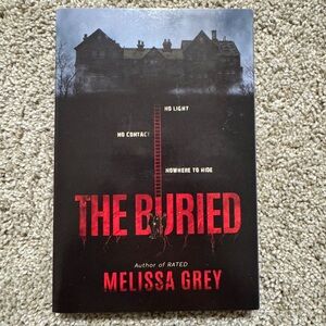 The Buried by Melissa Grey paperback book